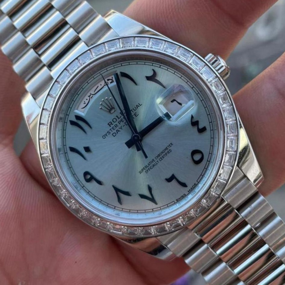 Platinum Rolex day date - Arabic dial - original - diamond bezel - very rare price on application